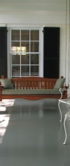 This Front Porch Is Comfortably Sized As An Outdoor Room To Enjoy The Well Groomed Landscaping.
